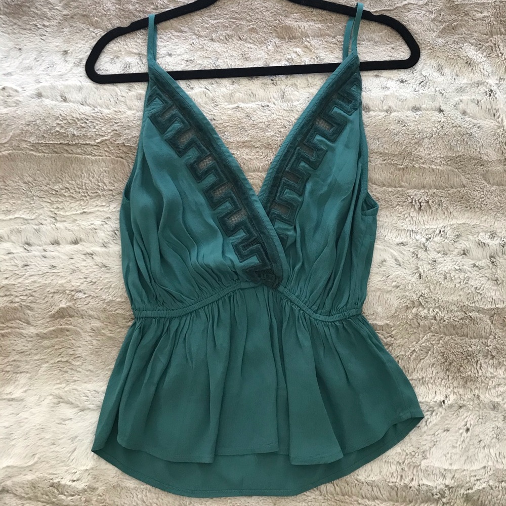 Never worn, backless free people top